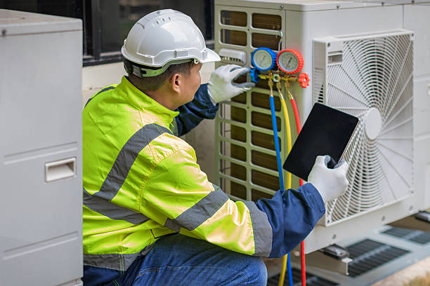 Professional Hvac technician working in Thomasville, AL